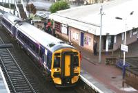 A train for Edinburgh Waverley pulls up at Falkirk Grahamston on 2 January 2013. <br><br>[John Furnevel 02/01/2013]