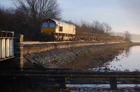 66107 skirts the Forth at Newmills with the 6K20 Seafield (Kirkcaldy) - Mossend engineers train on 6 January 2013. <br><br>[Bill Roberton 06/01/2013]