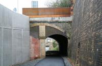 Close up of the south portal of Ladhope Tunnel, Galashiels, on 6 January 2013, with the recently completed new retaining wall in place between the road and the cutting to allow widening of the tunnel for the new railway. [See image 51280]<br><br>[John Furnevel 06/01/2013]