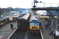 The driver and secondman lean out of the cab of D1501 at Ramsbottom station on 5 January, waiting for the down starter to clear for their train to proceed to Rawtenstall. Alongside on Platform 1 no D2062 is about to depart back to Bury with a 2 coach shuttle service.<br><br>[John McIntyre 05/01/2013]