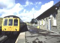 A DMU for Barry Island stands at Rhymney in September 1986.<br><br>[Ian Dinmore /09/1986]