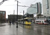 3000 Series tram 3012 pulls away from Piccadilly Gardens in Manchester city centre with a service for Bury. The tram will swing right behind the camera to initially head through the streets to Victoria station. New developments continue apace on Metrolink and in January 2013 it was announced that the extension from Piccadilly to Droylsden in the east will open in February 2013. <br><br>[Mark Bartlett 28/12/2012]