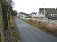 Looking south over the site of the new Galashiels railway station on 6 January 2013, with the bus station opposite on the west side of Ladhope Vale and the Church of Our Lady & St Andrew standing beyond. The Waverley route trackbed continues under Station Brae in the left background towards Tweedbank.<br><br>[John Furnevel 05/01/2013]