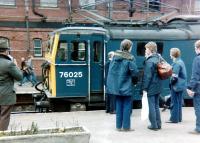 Platform scene at Guide Bridge on 21 April 1981 during a break on the LCGB <I>'Easter Tommy'</I> railtour. The special ran from Liverpool to Lincoln and back, with 76025 taking charge on the outward and return legs between Guide Bridge and Rotherwood Sidings. This was the last class 76 hauled passenger train.<br><br>[Colin Alexander 21/04/1981]