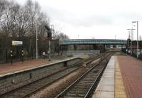 At the south end of St. Helen's platforms is the junction  with what was formerly the line to Sutton Oak, St Helens Junction and Widnes. Latterly this was cut back to a chemical plant within the town and has since been closed completely, although the track and signals remain in situ. Photographed in December 2012, with the now obligatory palisade fence erected across the disused tracks.<br><br>[Mark Bartlett 28/12/2012]