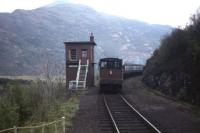 A Fort William-Mallaig mixed train disappears westwards from Lochailort station in the late 1960s. The closed signal box (of relatively modern design) and former crossing loop are very much in evidence.<br><br>[David Spaven //]