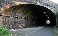 The north portal of Ladhope Tunnel, looking towards the site of the new Galashiels station, on 6 January 2013. Note the skew construction and the reduction in width at the south end [see image 41638]. [Note: Despite the name 'Ladhope Tunnel' (applied here on the basis of custom and practice) I understand the structure is technically an 'enhanced overbridge'.]<br><br>[John Furnevel 06/01/2013]