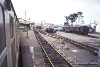 Approaching the platforms at Yeovil Pen Mill from the south in 1977 with  the goods yard looking fairly busy.<br><br>[Ian Dinmore //1977]