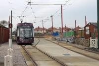 Until recently, the tramway civil engineers' sidings and yard were located at Thornton Gate.  An intricate track layout remains,  with passing loop and turnback siding, but the yard itself is now trackless and being redeveloped and the access point is redundant. <I>Flexity</I> Tram 016 passes the site of the yard as it leaves Thornton Gate for Fleetwood on 16 January.<br><br>[Mark Bartlett 16/01/2013]