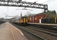 Although now reduced to two platforms Guide Bridge is still a busy spot with junctions at each end of the station. It sees frequent Trans Pennine services, Northern DMUs and EMUs and also freight traffic. 150271 pulls away on a service to Rose Hill via Hyde. The old platforms, off to the left of the picture [see image 20150], are now filled in.  <br><br>[Mark Bartlett 28/12/2012]