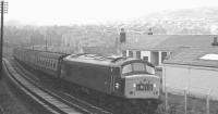 'Peak' D41 passing Loch Park PW depot shortly after leaving Hawick station on Christmas Eve 1968 with the 1M10 9.30am Edinburgh Waverley - Carlisle, carrying through coaches for London St Pancras.<br><br>[K A Gray 24/12/1968]