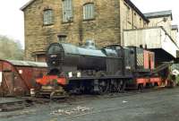 The start of something big! In September 1968 Fowler 4F 0-6-0 no 43924 became the first locomotive to be rescued from Barry scrapyard. Seen here in Haworth Yard in 1981 with its buffer beam supported on a trolley and timbers, whilst undergoing repair. <br><br>[David Pesterfield 16/04/1981]