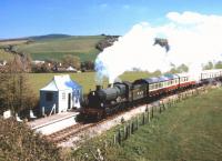 GWR 4-6-0 no 4920 <I>Dumbleton Hall</I> with a train at Doniford on the West Somerset Railway in March 1997.<br><br>[Peter Todd 31/03/1997]