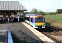 A morning Edinburgh - Aberdeen DMU about to restart from platform 2 at Leuchars on 19 May 2005.<br><br>[John Furnevel 19/05/2005]