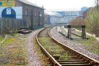 Looking south west from Quay Road level crossing past the former goods shed towards Bridlington Station in April 2009. The through lines from platforms 4 and 5 become single here on the route continuing north along the Yorshire coast to Seamer Junction and Scarborough. [See image 23828] <br><br>[John Furnevel 23/04/2009]