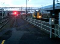 A class 350 emu forms the 15.55 to Crewe at Nuneaton platform 2 on Friday 21st December. The cutaway section of platform 3 (left) was damaged in the derailment of the Glasgow Sleeper in June 1975 and has yet to be fully repaired!<br><br>[Ken Strachan 21/12/2012]