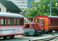 Room for a little one - one of the two diesel engines kept on the Nyon-Lacure line's Les Plantaz depot for track and OHL maintenance. Notice the English language advertising on the coach on the left.<br><br>[Ken Strachan 13/09/2009]