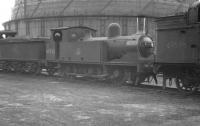 Locomotives stabled in the sidings alongside Kipps shed, thought to be in 1960, with J72 0-6-0T no 68733 standing centre stage. Built by Armstrong Whitworth in 1922, this example was eventually withdrawn from Hamilton West in July 1962. Gresley N2 0-6-2T no 69596 on the right was already nearing its end by this time and was withdrawn from here in September 1960.    <br><br>[K A Gray //1960]