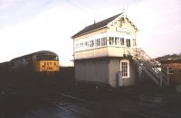 A class 56 about to pass East Holmes signal box, Lincoln, with a freight in January 1988.<br><br>[Ian Dinmore /01/1988]