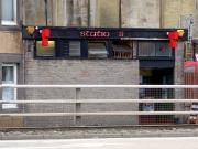 The rather forlorn-looking Station Bar, Fort William, marooned behind the dual carriageway, adjacent to the site of the original station - closed 1975 when the replacement was opened further north. <br>
<br><br>[Colin Miller 28/06/2010]