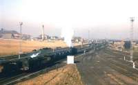 View north at Millerhill on 23rd February 1963, with the main line to the left and the reception sidings for the Up Yard (opened eight months earlier) on the right. Newcraighall Colliery stands in the left background.<br><br>[Frank Spaven Collection (Courtesy David Spaven) 23/02/1963]