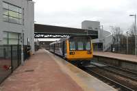 An afternoon stopping service from Liverpool Lime St to Wigan North Western pauses outside the new station building at St Helens Central (formerly Shaw St). The elderly Pacers are still intensively used around Manchester and Liverpool but will be the first DMUs to go when these lines are electrified.  <br><br>[Mark Bartlett 28/12/2012]