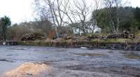 Remains of the island platform at Broughton in January 2013. The view looks south over the obliterated eastbound platform to the westbound platform, the reverse side of which served the Talla Railway.<br><br>[Ewan Crawford 06/01/2013]