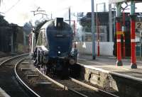 Having taken over the London - Carlisle 'Winter Cumbrian Mountain Express' at Carnforth, A4 no. 60009 <I>Union of South Africa</I> is making good progress as it rushes through Oxenholme on 2 February 2013. (A passenger waiting for a southbound service commented afterwards that he didn't realise steam trains could go that fast!)<br><br>[John McIntyre 02/02/2013]