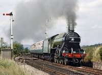 <I>Flying Scotsman</I> south of Hellifield with the Carnforth to Leeds stage of the LNER Society's 'West Yorkshireman' on 21st June 1975. The LNER Society organised two tours for this date - these ran combined from Euston to Carnforth, with the other half of the train being taken forward to Ravenglass and Sellafield as 'The Furnessman' by (6)1306 and <I>Green Arrow</I>.<br><br>[Bill Jamieson 21/06/1975]