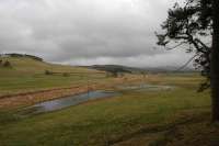 Nice weather for ducks. Flooded fields surround the former Symington, Biggar and Broughton Railway. This view is some way west of Broughton and looks east.<br><br>[Ewan Crawford 06/01/2013]