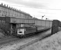 The 11.20 Newcastle Central to Liverpool Lime Street express approaches Marsden station on 11 November 1980 with class 47 No. 47415 in charge.<br><br>[Bill Jamieson 11/11/1980]