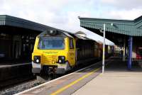 Freightliner 70020 eastbound through Didcot station with containers on 5 February 2013.<br><br>[Peter Todd 05/02/2013]