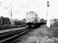 A class 37 brings a freight into the south end of Mossend yard in the summer of 1996.<br><br>[John Furnevel 01/07/1996]