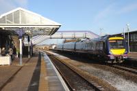 An Edinburgh bound service about to depart from a well maintained Inverurie station on a cold February morning in 2013.<br><br>[Brian Taylor 07/02/2013]