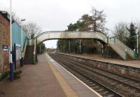 Dalston, looking towards Wigton and Maryport on a Sunday morning in February 2013. Beyond the platforms, near the overbridge, is the access to the old goods yard, now an oil terminal served by trains from Grangemouth.<br><br>[Mark Bartlett 03/02/2013]