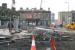 View west over what is normally one of Edinburgh's busiest road junctions, seen here on 12 December 2012, with tramworks having taken over completely. Beyond the station building work is underway on expansion of the existing facilities to cope with future train/tram/bus/taxi interchange traffic.<br><br>[John Furnevel 12/12/2012]