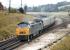 'Western' diesel hydraulic No. D1070 <I>Western Gauntlet</I> seen shortly after departure from Exeter St. Davids with a Paddington express in 1971. The train is approaching Cowley Bridge Junction, where the Barnstaple branch leaves the West of England main line.<br><br>[Bill Jamieson 23/07/1971]