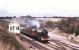 Stanier Pacific no 6201 <I>Princess Elizabeth</I> passing Little Mill Junction, Monmouthshire, with a special in September 1987. The train is southbound on the Hereford - Newport main line with the Monmouth route (then cut back to RoF Glascoed) running off to the north east. The station at Little Mill Junction had closed in 1955. <br><br>[Ian Dinmore /09/1987]