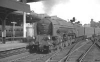 A1 Pacific no 60160 <I>Auld Reekie</I> at Newcastle in 1963 with the <I>Anglo-Scottish Car Carrier</I>. Launched in 1954 with a service between London (Holloway) and Perth this was the forerunner of the BR Motorail service [see image 4643].<br><br>[K A Gray //1963]