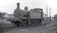 41734 on the coaling stage road at Barrow Hill shed, probably taken in the early 1960s. The locomotive was eventually withdrawn from Langwith Junction at the end of 1966.<br><br>[K A Gray //]