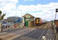 An East Midlands class 158, seen shortly after passing through Lakenheath station, Suffolk, in 2012 on a Liverpool Lime Street - Norwich service.<br>
<br>
<br><br>[Ian Dinmore //2012]