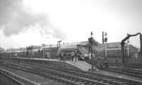 60007 <I>Sir Nigel Gresley</I> stands at Doncaster on 6 July 1963 with the LCGB 'Mallard Commemorative Railtour'. The special, which ran from Kings Cross, had been arranged to mark the 25th anniversary of the world speed record for steam set by <I>Mallard</I> and had included visits to York Railway Museum and Doncaster Works. (No 60007 reached a speed of 102 mph on Stoke bank during this trip.)<br><br>[K A Gray 06/07/1963]