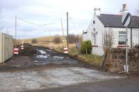 Access point north from the former level crossing at Heriot on 16 February 2013. As with the south side of the crossing a concrete pad has been laid across the entrance. [See image 42083]<br><br>[Bill Roberton 16/02/2013]