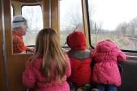 <I>Railbuses are fun!</I> Driver Green is the focus of attention for three young passengers as he leaves Strand Rd to return to the Ribble Steam museum on the first day of public operation with the 1958 built Waggon-und-Maschinenbau railbus E79960.<br><br>[Mark Bartlett 20/02/2013]