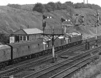 I'm not sure whether a class 40 pairing qualified as 'super power' but it was certainly super heavyweight! 40183 (leading) and 40123 are signalled onto the Wakefield Kirkgate line at Goose Hill Junction, Normanton, in July 1975. The train is the Bradford Forster Square - Manchester Red Bank newspaper empties, a regular double-headed working.<br><br>[Bill Jamieson 19/07/1975]