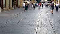 Abandoned tracks of the original narrow-gauge tram line that once served Krakow. This ran from the railway station to the River Wisla right through the Rynek Glowny (Main Square) but was superseded by the standard gauge route around the periphery of the Old Town.<br><br>[Colin Miller 27/07/2012]