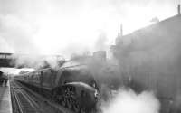 The RCTS 'A4 to Glasgow' railtour stands at Beattock station on 16 July 1967 behind no 60019 <I>Bittern</I>. The special, which had originated from Leeds, ran north from Carlisle to Glasgow Central on the WCML and returned via the GSW route. An EE Type 1 provided assistance on the ascent of Beattock bank.  <br><br>[K A Gray 16/07/1967]