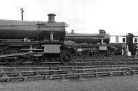 An all GWR line-up at Didcot Railway Centre in October 1975 - it is the home of the Great Western Society after all! L to r No. 7808 <I>Cookham Manor</I>, No. 6998 <I>Burton Agnes Hall</I> and Ocean Saloon coach No. 9112 <I>Queen Mary</I>.<br><br>[Bill Jamieson 04/10/1975]