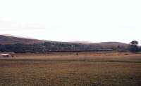 Looking across country near Newtonmore on 5th August 1961, as a pair of Type 2 diesel locomotives pass southbound at the head of the 16-coach <I>Royal Highlander</I> for London Euston.<br><br>[Frank Spaven Collection (Courtesy David Spaven) 05/08/1961]