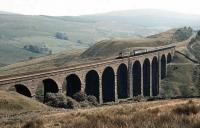 An unidentified class 31 takes a 5-coach train over Arten Gill Viaduct in 1983. <br><br>[Ian Dinmore //1983]